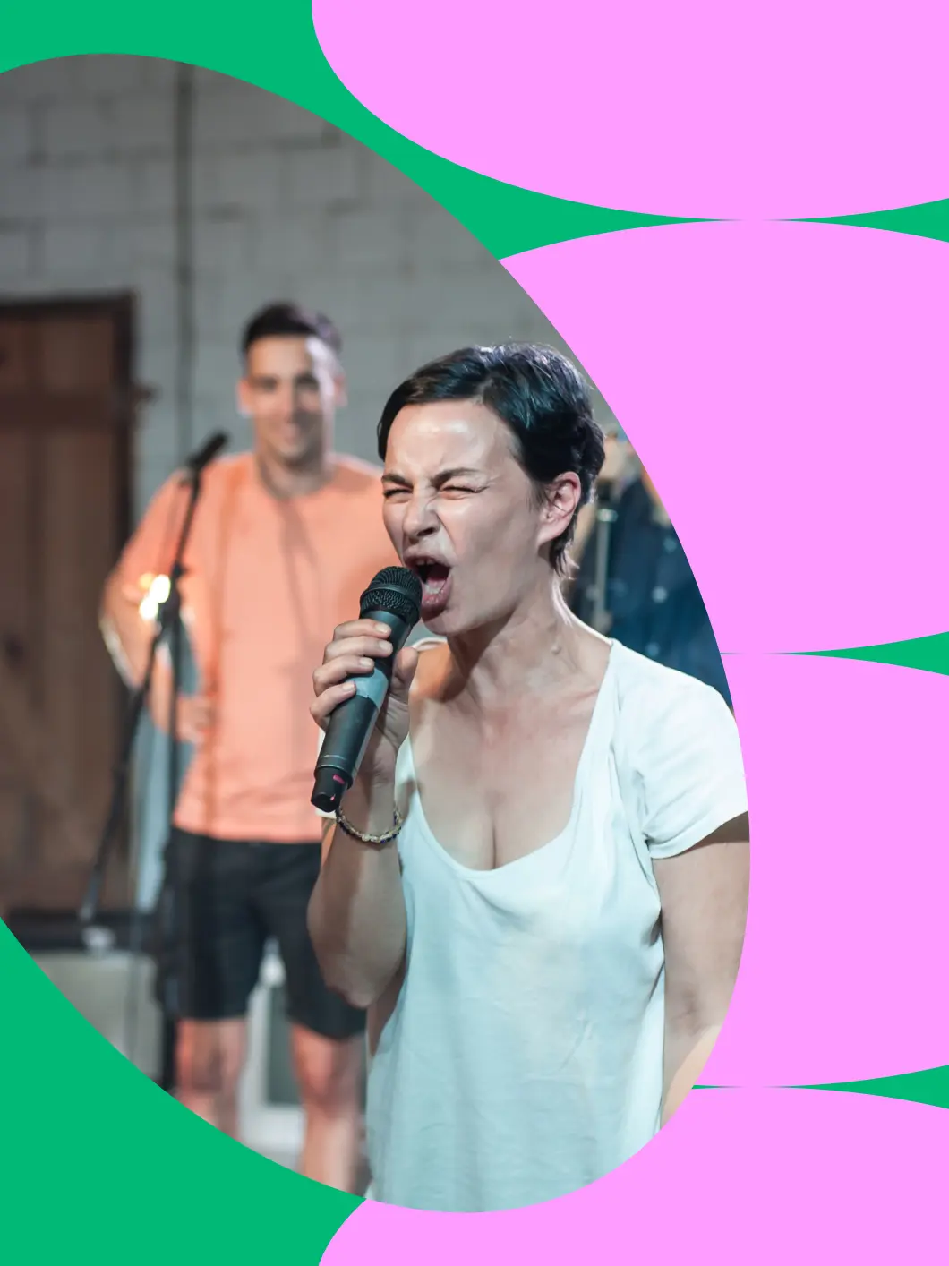 Woman speaking expressively into a microphone during a communication exercise