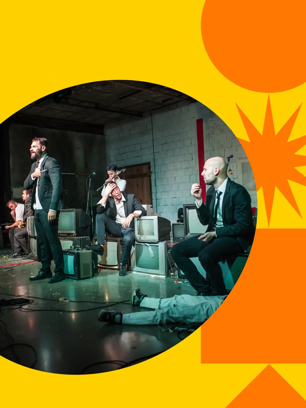 Actors performing a scenic storytelling scene on stage